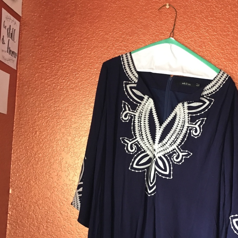 Navy dress with white lace pattern